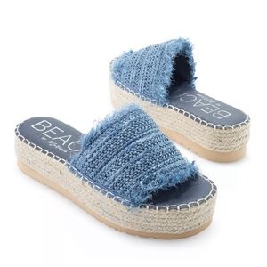 Beautiful denim sandals. Worn once, size 9. The frayed detail is super cute!